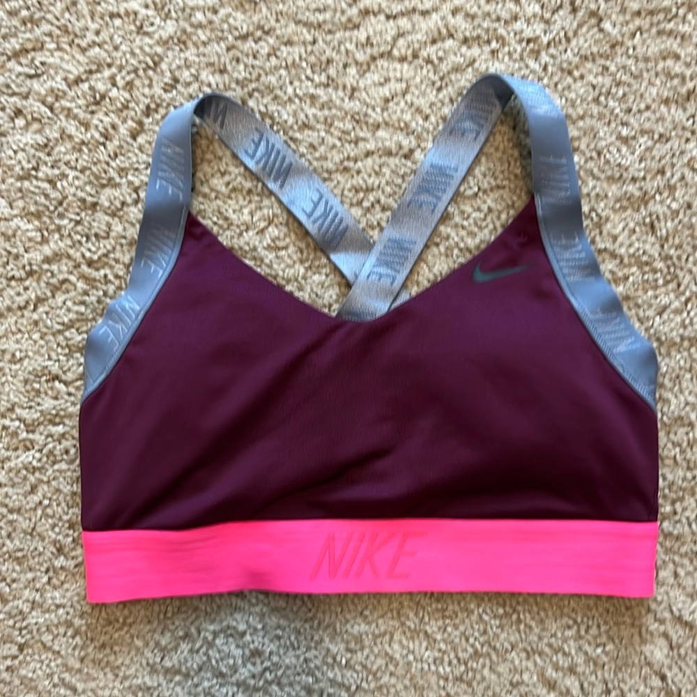Pink and purple Nike sports bra